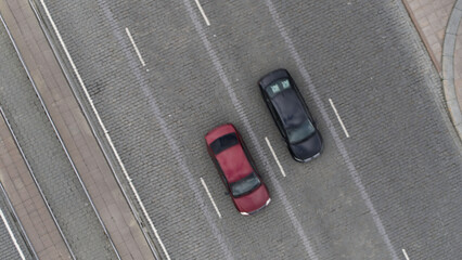 Bird's-eye view. Stock footage.View of the marking with the road and vehicles moving in different directions.