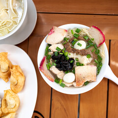 special wantan soup, with pork and vegetables. chinese peruvian food