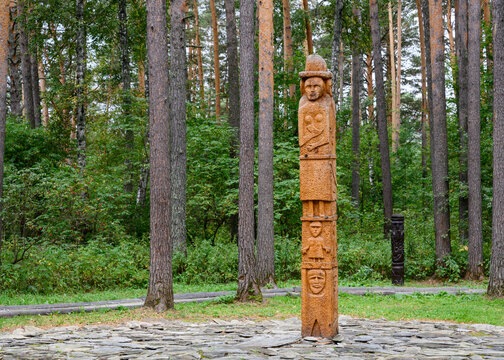 Reconstruction of Zbruch Idol symbolizing the thee-part structure of the universe in the forest in Siberia, Russia