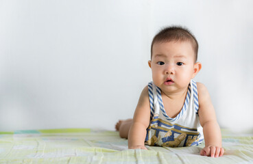 Fototapeta premium beautiful asia cute baby crawling in room at home