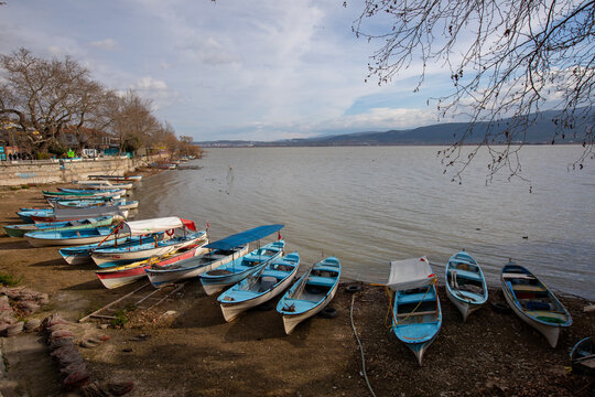 Golyazi, Turkey, December 26, 2021; Fishermen are going to fishing by boat in Uluabat Lake, BURSA, TURKEY