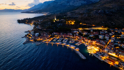 Take in the breathtaking view of Croatia's ports and marinas from above, showcasing luxurious...