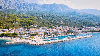 Take in the breathtaking view of Croatia's ports and marinas from above, showcasing luxurious...