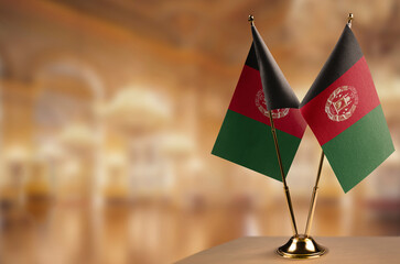 A small Afghanistan flag on an abstract blurry background