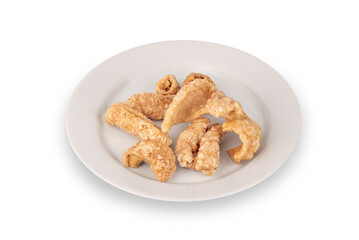 pork scratching or pork crackling on dish