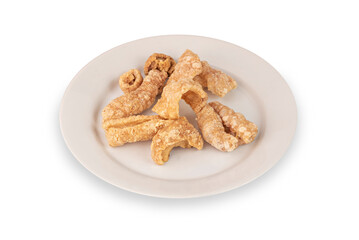 pork scratching or pork crackling on dish