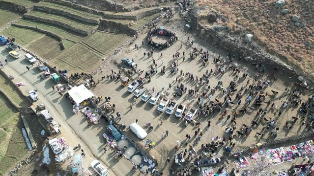 one day bazar in villages, Alishing District of Laghman Province, aerial video of Afghanistan
