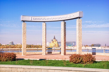 Stele of the Tourist Information Center and Alexander Nevsky Cathedral on the banks of the Volga,...