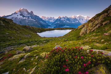 Gorgeous morning scene of high alpine lake Lac Blanc and Mont Blanc glacier. Graian Alps, France, Europe. - obrazy, fototapety, plakaty