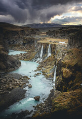 Beautiful sunset and landscape of Sigoldugljufur canyon with many small waterfalls and the blue river in Highlands of Iceland