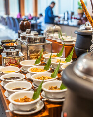 Catering banquet table at reception. Restaurant presentation, european cuisine, food consumption, party concept. Food styling, appetizers bar, welcome drink, event design.