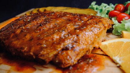 Selective focus grill pork ribs on wooden board..