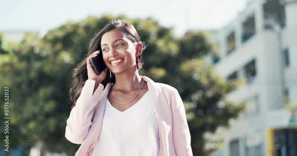 Wall mural Woman, phone call and walking in the city for conversation, discussion or communication outdoors. Happy female having a walk talking with smile on smartphone for chat in the street of a urban town