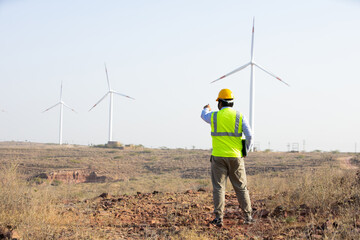 Clean and green energy. operation to generate electricity,, Back view of India engineer supervisor...