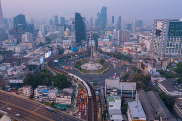 Naklejka na ściany i meble Beautiful Roundabout Victory Monument Aerial Top view Thailand with long exposure cars traffic