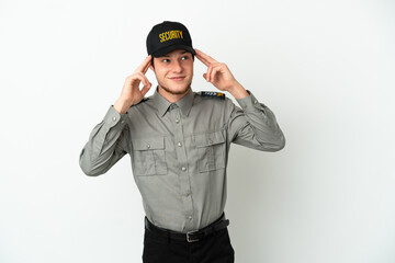 Young Russian security man isolated on white background having doubts and thinking