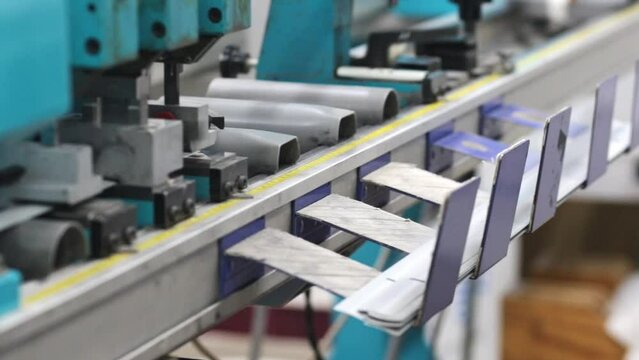 Machine for making metal blinds. Factory