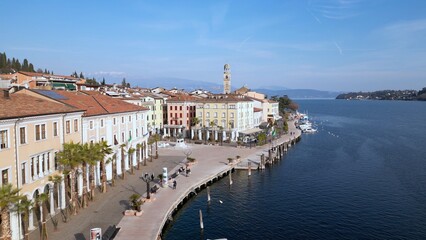 Europe, Italy, Brescia , Garda lake , Salo' drone aerial view of  village with church and lake with...
