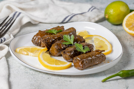 Leaf wrapping or dolmades appetizer a mediterranean cuisi of stuffed vine leaves. Yaprak sarma. Turkish appetizer varieties