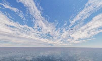 The plane is flying over the vast ocean with the beautiful sky and clouds in the background.3d rendering