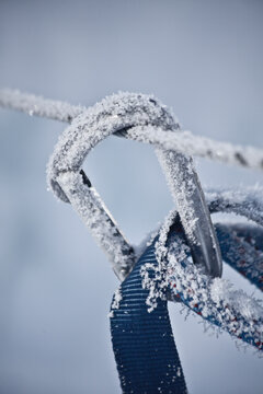Iced-over carabiner.