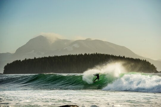 Surfer turns on a frigid Canadian wave