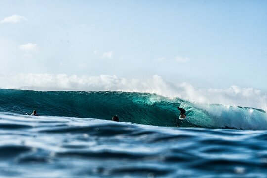 Finding some shelter under a barrel wave