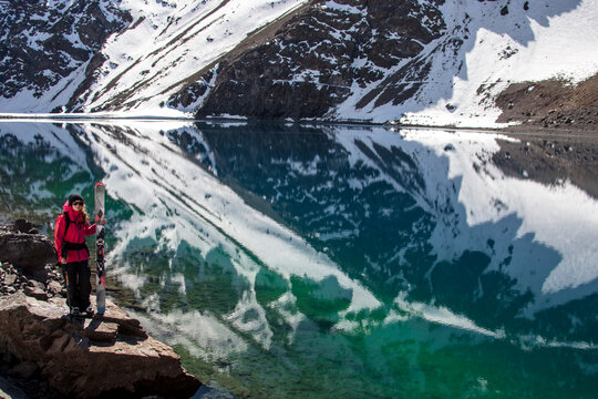 Skiier along water in Portillo, Chile