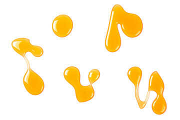 honey drops isolated on white background, Top view.