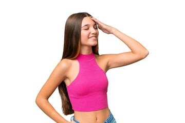 Teenager caucasian girl over isolated background smiling a lot