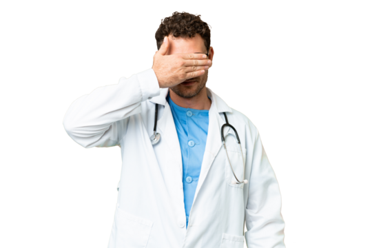 Brazilian doctor man over isolated chroma key background covering eyes by hands. Do not want to see something