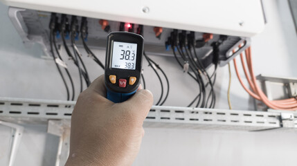 Checking Temperature the string cables input to inverter solar panel used thermo infrared,...