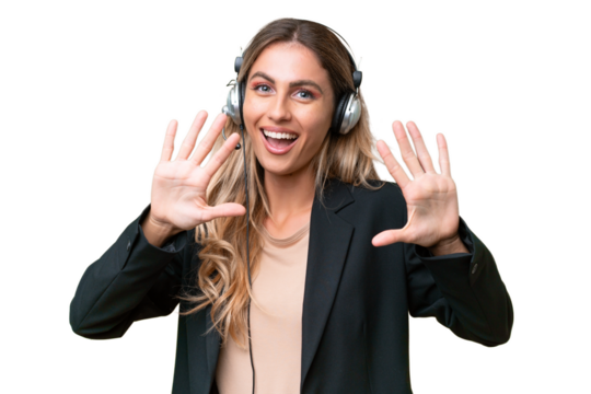 Telemarketer pretty Uruguayan woman working with a headset over isolated background counting ten with fingers