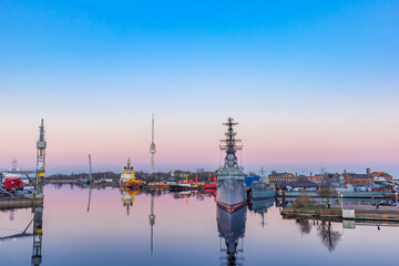 Fototapeta na wymiar Warship in the colorful harbor of Wilhelmshaven, Germany