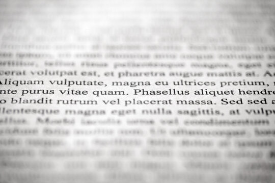 Lorem Ipsum text on printed on paper, sample document, selective focus