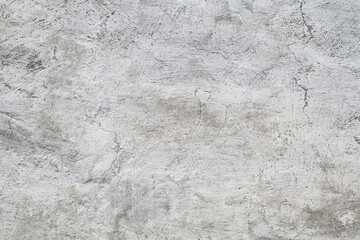 Rough plastered grey surface, background wallpaper, uniform texture pattern