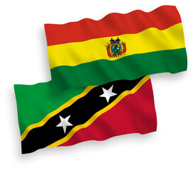 Flags of Federation of Saint Christopher and Nevis and Bolivia on a white background