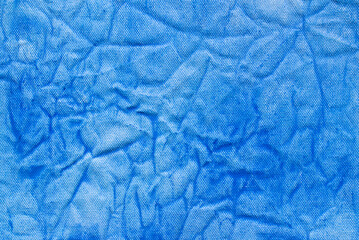 blue painted on creased canvas background texture