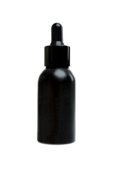 Black bottle with a dispenser with a pipette. Beauty and health industry. Space for the text. Isolated on a white background. All -in.