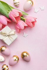 Pink tulips and Easter eggs background