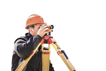 A worker in an orange helmet measures the level on a white isolated background. Geodetic...