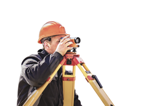 A worker in an orange helmet measures the level on a white isolated background. Geodetic measurements before embarking on major construction projects. Elevation mark in construction work.