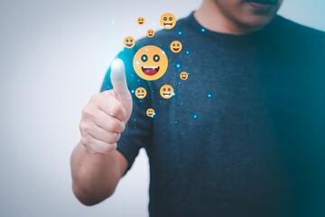 Satisfaction survey and customer service concept, businessman using a smartphone to answer the questionnaire and give a satisfaction rating, offering a 5-star satisfaction rating