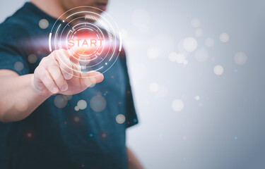 a person touching virtual screen to press the start button, concept management startup digital transformation Internet of Things, Big Data and Business Processes, Automated Operations, Data Storage