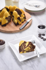 A Homemade cake made of chocolate and vanilla 
