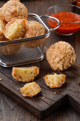 Bakwan Goreng or Cah Yen is Chinese street food made from flour and chopped chicken and prawns, shaped into rounds and fried and eaten with chili sauce.

