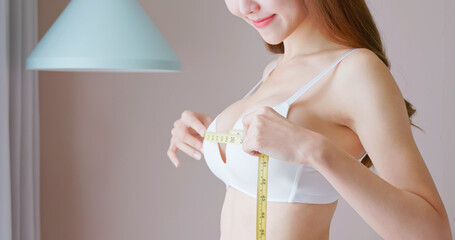 Woman measure body chest size - obrazy, fototapety, plakaty