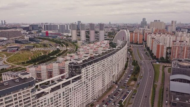 Establishing shot on a modern district of Moscow in the summer. Air view of the quarter with developed infrastructure and modern houses