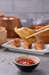 Kuotie is the Chinese-Indonesian interpretation of guotie. It basically tastes very similar to guotie, the main difference is that kuotie is much more garlicky in flavour. 
