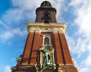 Sculpture of Archangel Michael fighting Satan at St. Michaelis Church in Hamburg